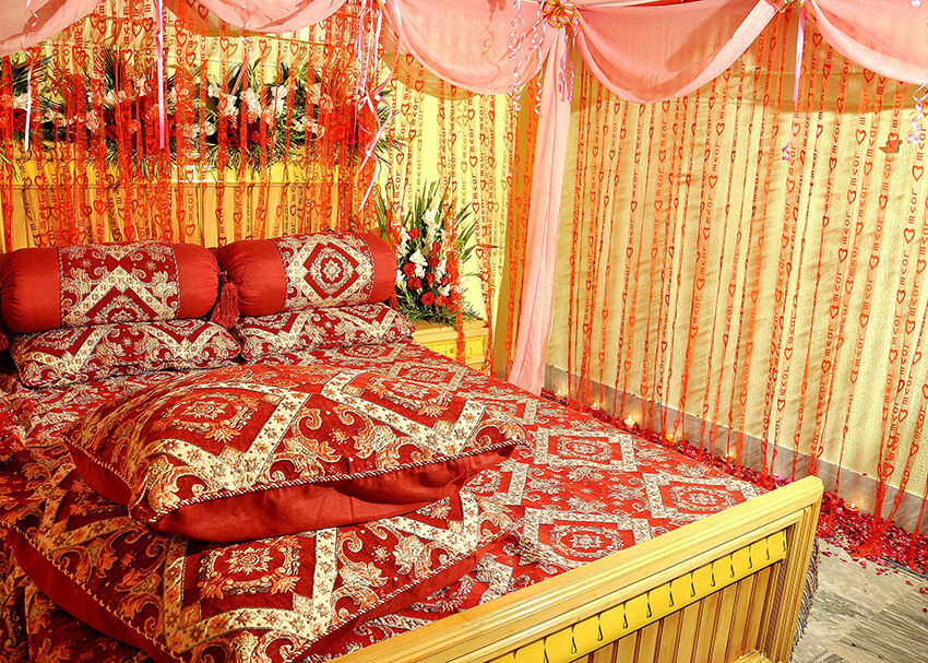 a Thai two-bed hotel room with warm colors in decoration 
