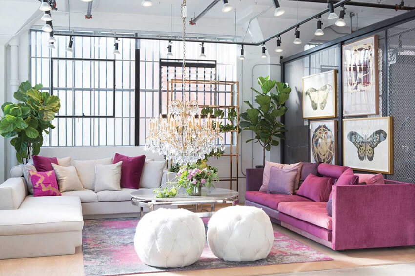 an art deco interior design with pink and white furniture and a pink-themed carpet