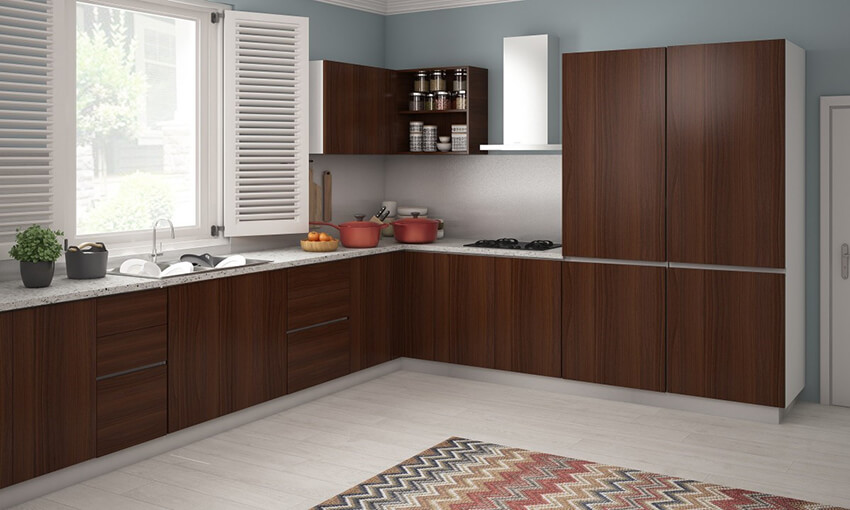 A kitchen with L shape look