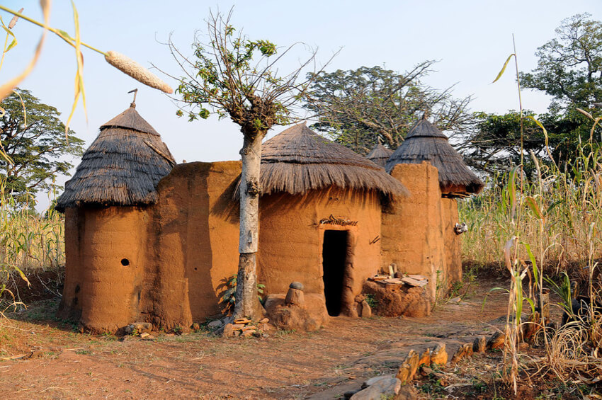 a native mud house with thatched roof as an indigenous African architecture