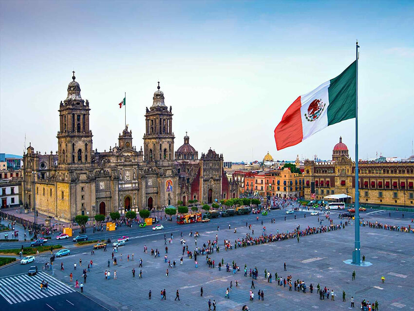 Traditional Mexican architecture with national flag-feature