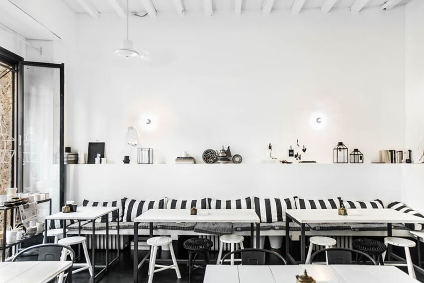 a modern and yet classy restaurant with black and white theme and modern interior design