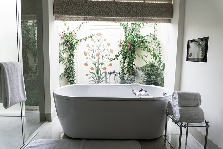 A bathroom inside view with green decor