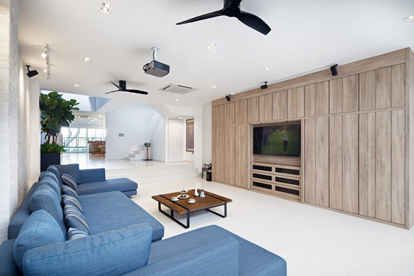 Minimalist living room with blue sofas