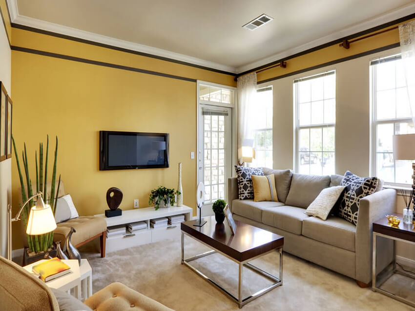 a living room with light color theme and yellow walls