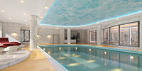 the large modern pool in the interior space of a modern mansion