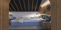 large bright color bed in the interior space of a wooden bedroom