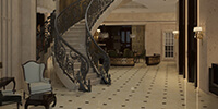 luxury curved stair with baroque style handrails in hotel lobby design