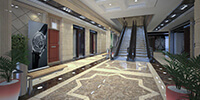 the entrance area of a commercial building with designed stone flooring