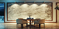 dining table in the interior space of a contemporary restaurant near a natural stone wall 