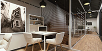 interior space of a small office working area with light wood flooring and modern white furniture