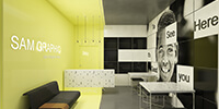 the combination of yellow color and concrete in the reception area of a modern office
