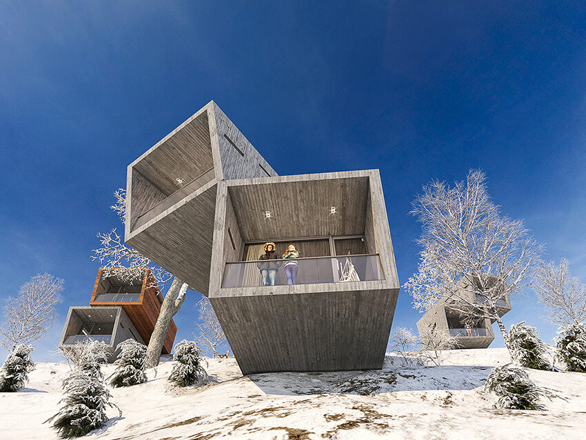 two-story concrete mountain hotel located in a snowy landscape 