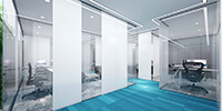 interior space of a modern office with blue color carpet and glass partitions