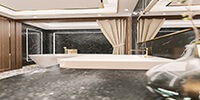 interior space of a luxury bathroom with dark color stone walls and small ceramic tiles flooring