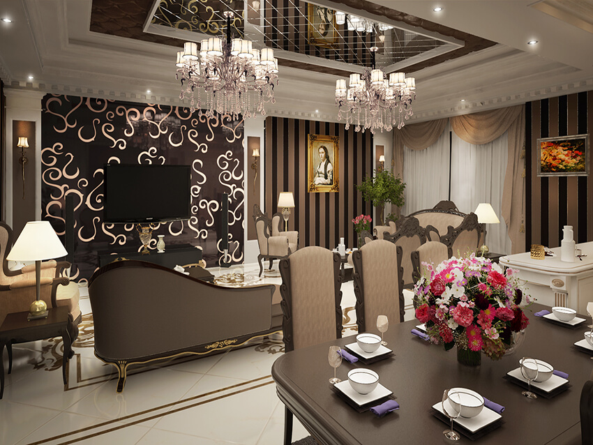 Dining and living room of a dark color luxury apartment with a wooden dining table and crystal chandelier