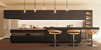 modern kitchen with dark matt cabinets, parquet flooring, and pendant lights 