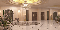 interior space of the hotel lobby with cream color stone flooring and round golden decorative ceiling with glass chandelier 