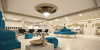 interior space of a luxury salon with bright color stone flooring and blue color furniture