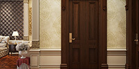 dark color wooden door in the entrance area of a luxury hotel room