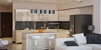 open space kitchen with high gloss cabinets