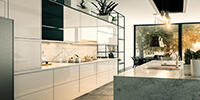 interior space of a modern kitchen with high gloss white cabinets and modern pendant lights 